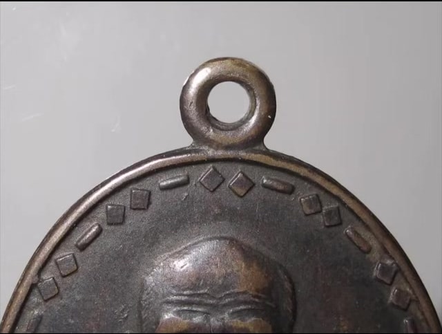 A Four-Step Screen for Metal Amulets: Loop, Rim, Lettering and Surface